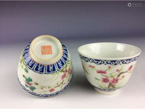 A pair of Chinese famille rose cups with floral motif