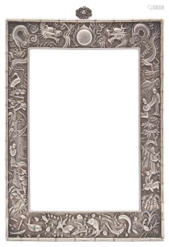 A Chinese silver photo frame, maker KMS: of rectangular outline, decorated with fish, figures,