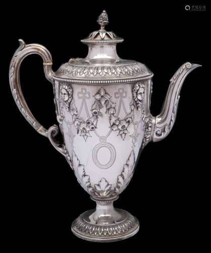 A Victorian silver coffee pot, maker Richard Martin & Ebenezer Hall, Sheffield, 1865: of ovoid form,