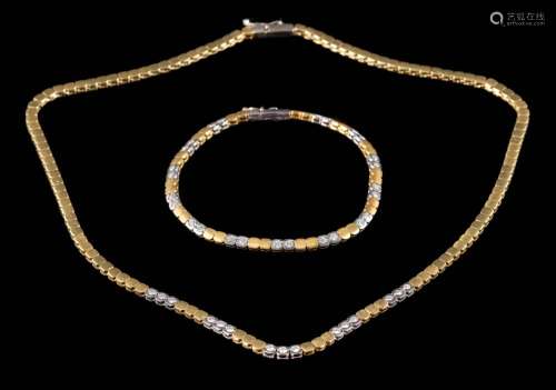 A diamond mounted two-tone necklace together with a matching bracelet: set with round,