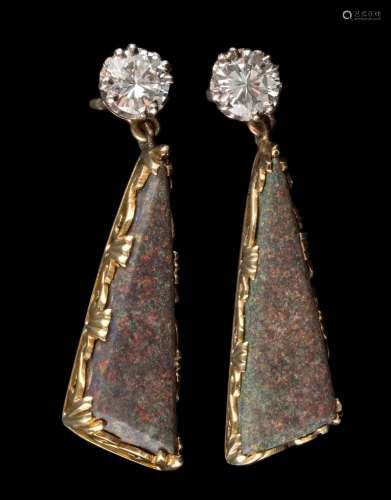 A pair of diamond and black opal drop earrings: each with a circular brilliant-cut diamond