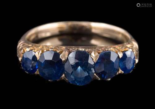 A late 19th century gold and sapphire five-stone half-hoop ring: the cushion-shaped sapphires
