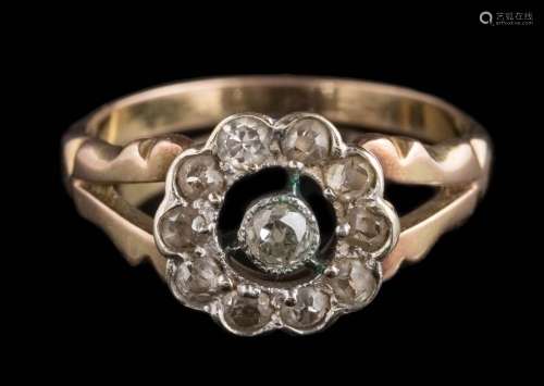 An antique diamond mounted circular cluster ring: with round old brilliant and brilliant-cut