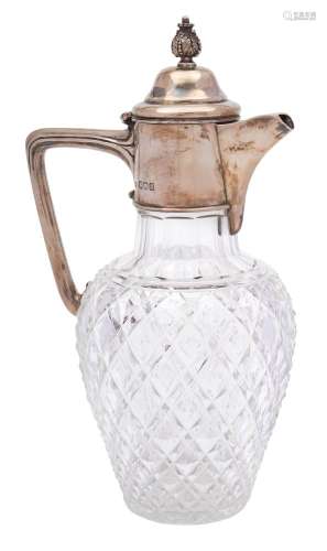 An Edward VII clear glass and silver mounted claret jug, maker Mappin & Webb, London,