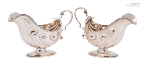 A pair of late Victorian silver sauceboats, maker Joshiah Williams & Co, London,