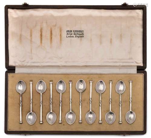 Omar Ramsden - a set of twelve beaten silver coffee spoons, London,