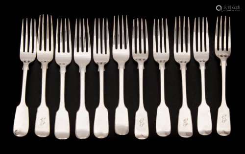 A collection of eleven silver Fiddle pattern dessert forks,