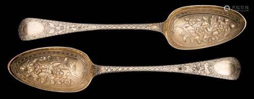 A matched pair of Victorian Old English pattern silver berry spoons maker's marks worn London,