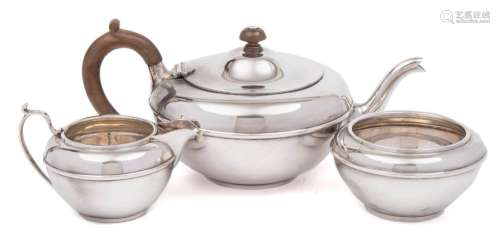 A George V silver three piece tea service, maker Charles & Richard Comyns, London,