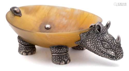 A horn and white metal mounted dish in the form of a rhino: with cast head, feet and tail, 16cm.