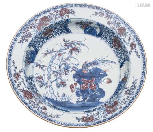 A Chinese underglaze blue and copper red basin: with flared rim,