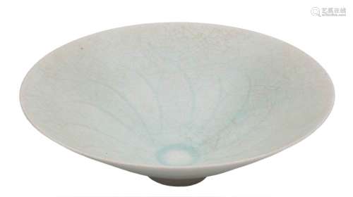 A Chinese Qingbai porcelain bowl: of flared conical form, covered in a crackled pale celadon glaze,