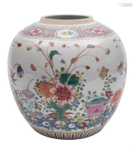 A Chinese famille rose ginger jar: painted with a jardiniere and a vase amongst floral sprays and