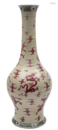 A Chinese copper red and yellow ground dragon vase: with ovoid body and long slender neck,