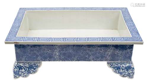 A large Japanese blue and white rectangular jardiniere: painted with a key pattern to the flattened