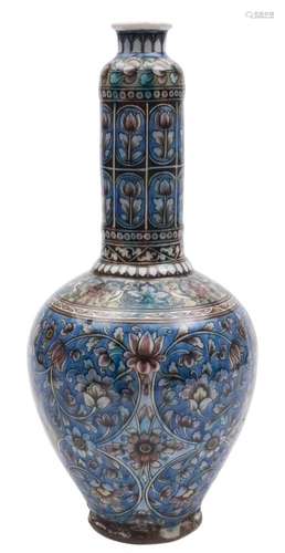 A group of four pieces of Turkish Kutahya pottery: including two long-necked jars,