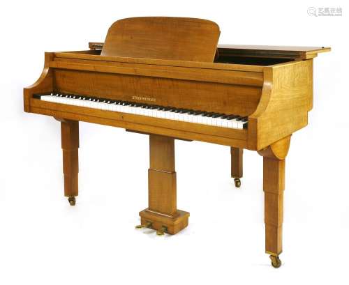 An Art Deco walnut Strohmenger baby grand piano,
