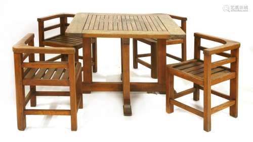 An Heal's teak garden table and four chairs,