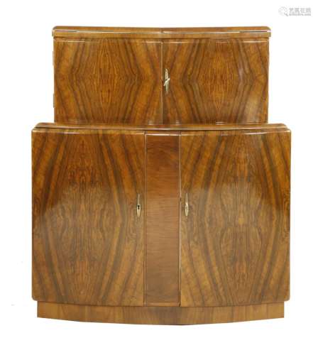 A walnut bow front cocktail cabinet,