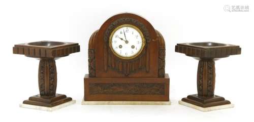 A French walnut clock garniture,