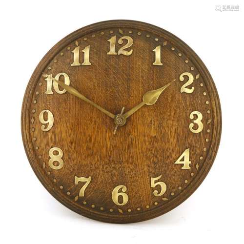 An Heal's oak convex wall clock,