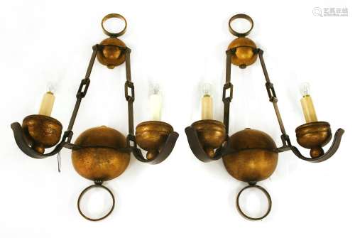 A pair of French iron and wood wall lights