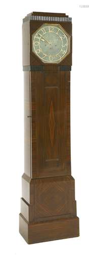 An Art Deco Macassar veneered cocktail cabinet longcase clock,