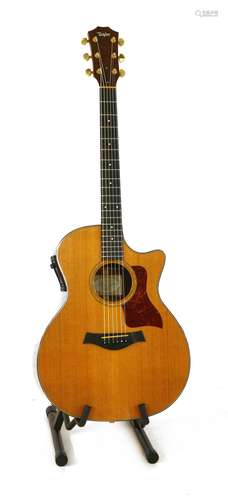 A 2001 Taylor 714-CE electro acoustic guitar,