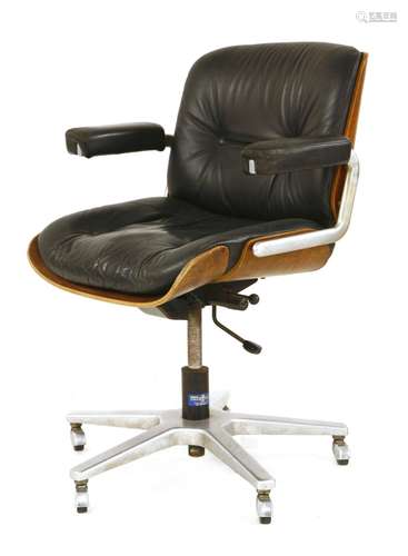 An Eames-style revolving desk chair