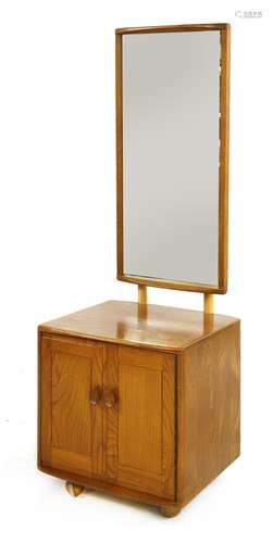 An Ercol cheval mirror,