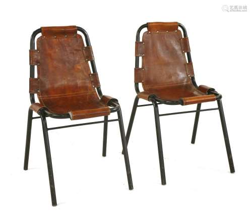 A pair of tubular chairs,