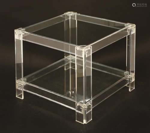 A lucite and glass side table,