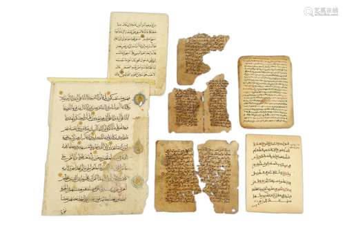 A SCHOLARLY MISCELLANEOUS COLLECTION OF THIRTY-TWO FRAGMENTED CALLIGRAPHIC FOLIOS