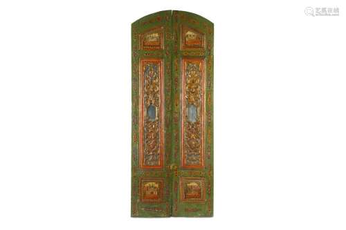 A SET OF CARVED AND PAINTED DOORS