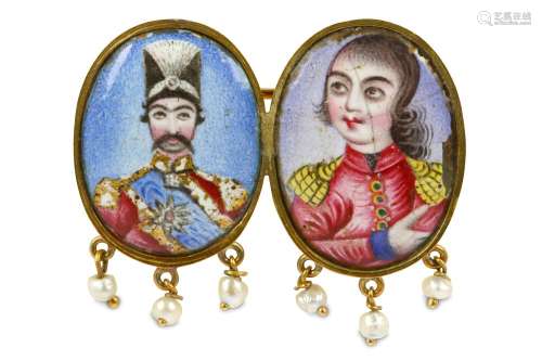 *A BROOCH WITH PAINTED ENAMEL PORTRAITS