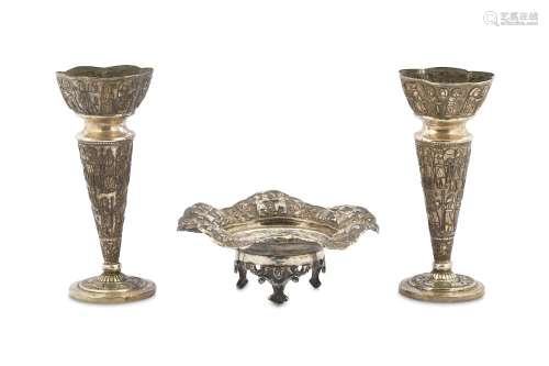 TWO SILVER REPOUSSÉ CANDLESTICKS AND A SMALL SERVING DISH