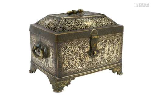 AN ENGRAVED AND PIERCED BRASS CASKET