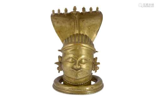 A LARGE BRASS SHIVA LINGAM COVER