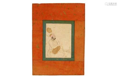 HARI SINGH RATHOR OF THE JOGIDASA CLAN SMOKING A HUQQA