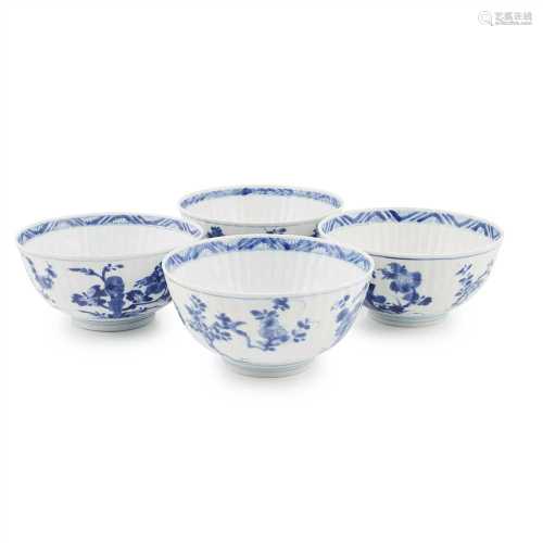 COLLECTION OF FOUR BLUE AND WHITE DEEP BOWLS QING DYNASTY, KANGXI PERIOD each modelled with ribbed