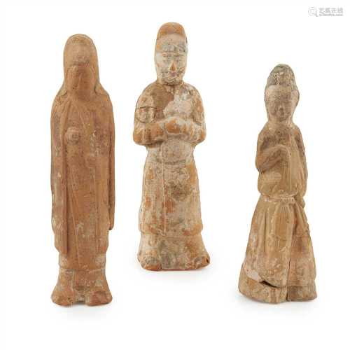 THREE POTTERY FIGURES TANG DYNASTY, 8TH-10TH CENTURY comprising a lady dressed in long dres with