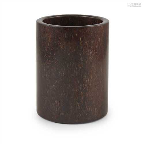 ZITAN BRUSH POT QING DYNASTY, 18TH CENTURY of very plain cylindrical form, the base with slight