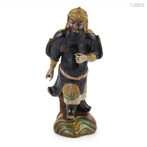 CHINESE PORCELAIN FIGURE OF A WARRIOR LATE QING DYNASTY depicting a striding man in back military