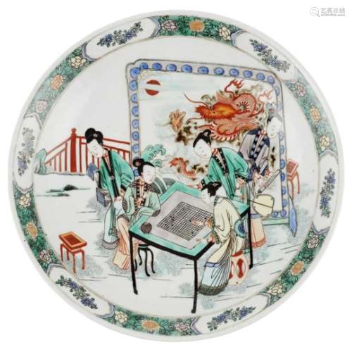 WUCAI PLATE KANGXI MARK, BUT PROBABLY LATER OF REPUBLIC PERIOD painted with a domestic scene at a