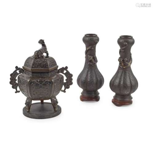 PAIR OF JAPANESE CAST IRON VASES MEIJI PERIOD each vase with garlic-head type mouths, the slender
