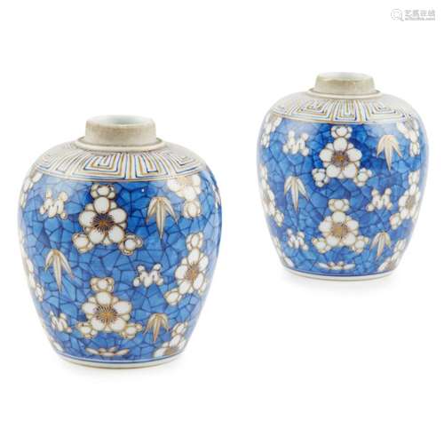 PAIR OF 'CRACKED ICE AND PRUNUS' JARS MEIJI PERIOD each of ovoid shape, decorated with gilt