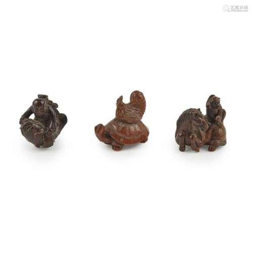 COLLECTION OF THREE CARVED WOOD NETSUKE MEIJI PERIOD the first as a turtle with a chicken on its