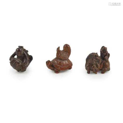 COLLECTION OF THREE CARVED WOOD NETSUKE MEIJI PERIOD the first as a turtle with a chicken on its