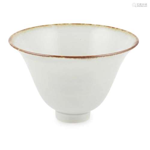 JAPANESE SMALL BOWL 20TH CENTURY of inverted tapering form, the rim with variegated brown glaze,