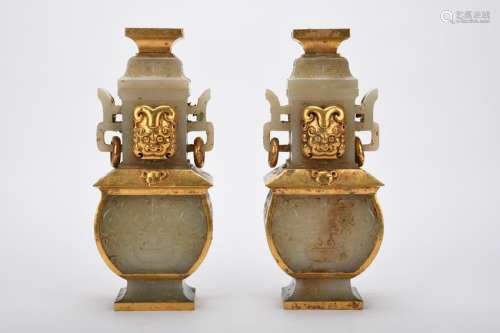 Chinese Pair Of Early White Jade Gold Gilded Beastface